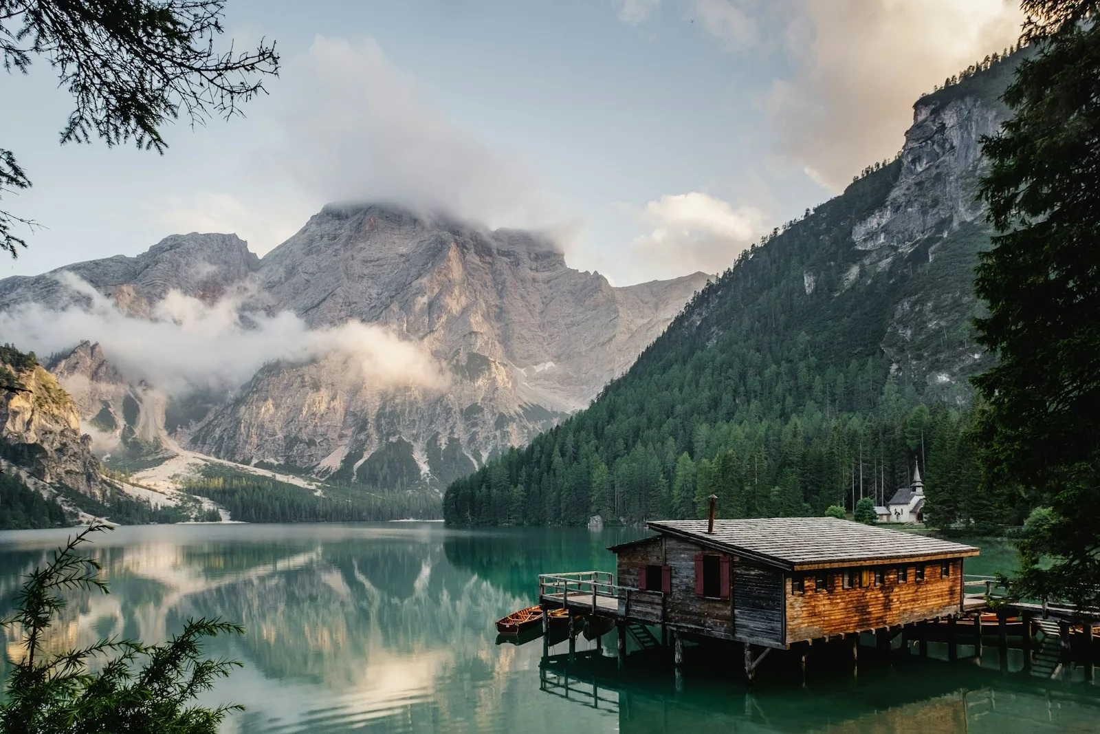 Still water beneath mountains